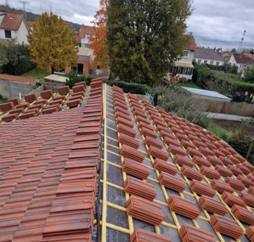 Tuiles neuves posées sur liteaux, réfection de toiture